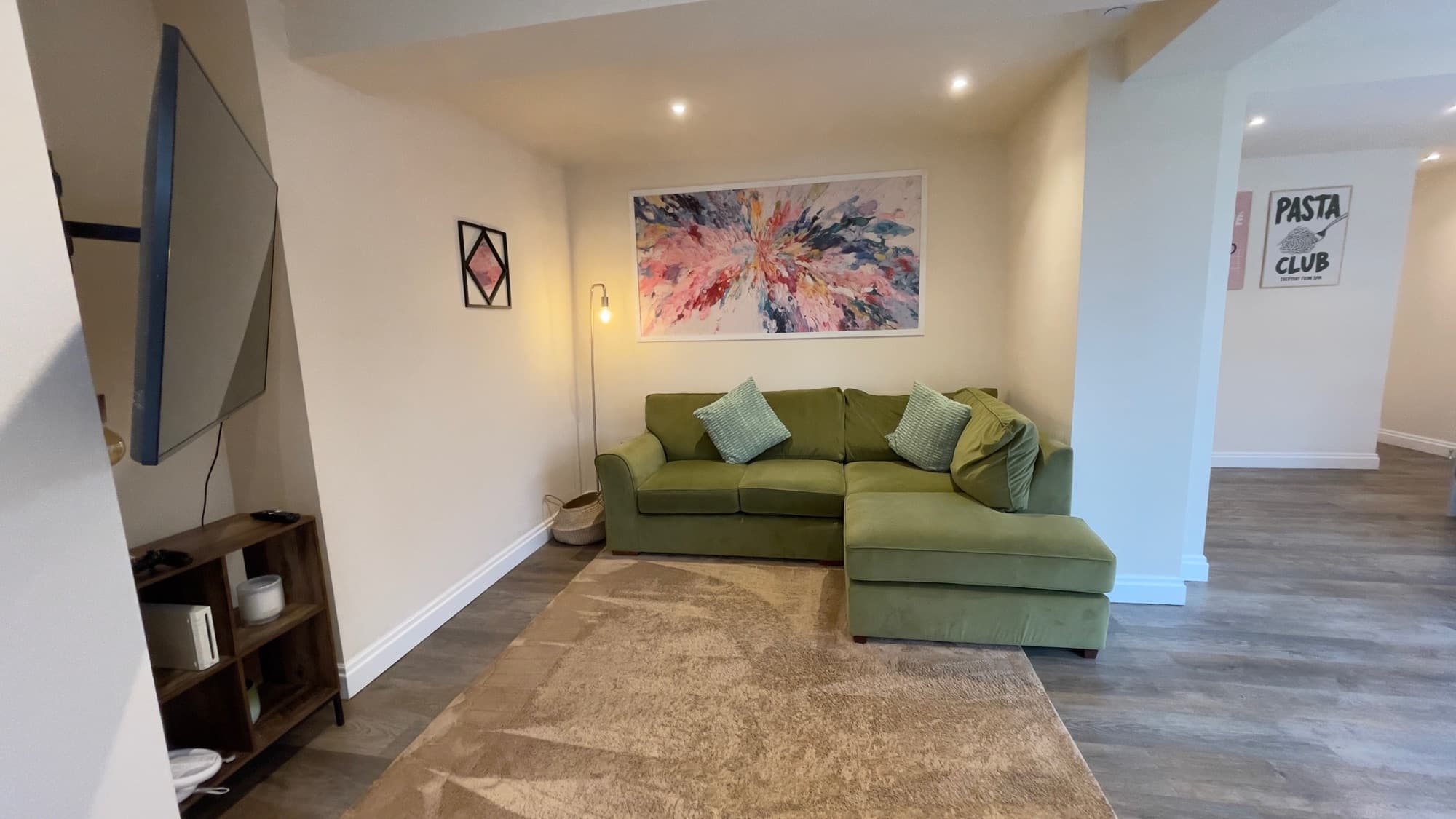 The living room of a serviced property, cleaned and staged for the next guest