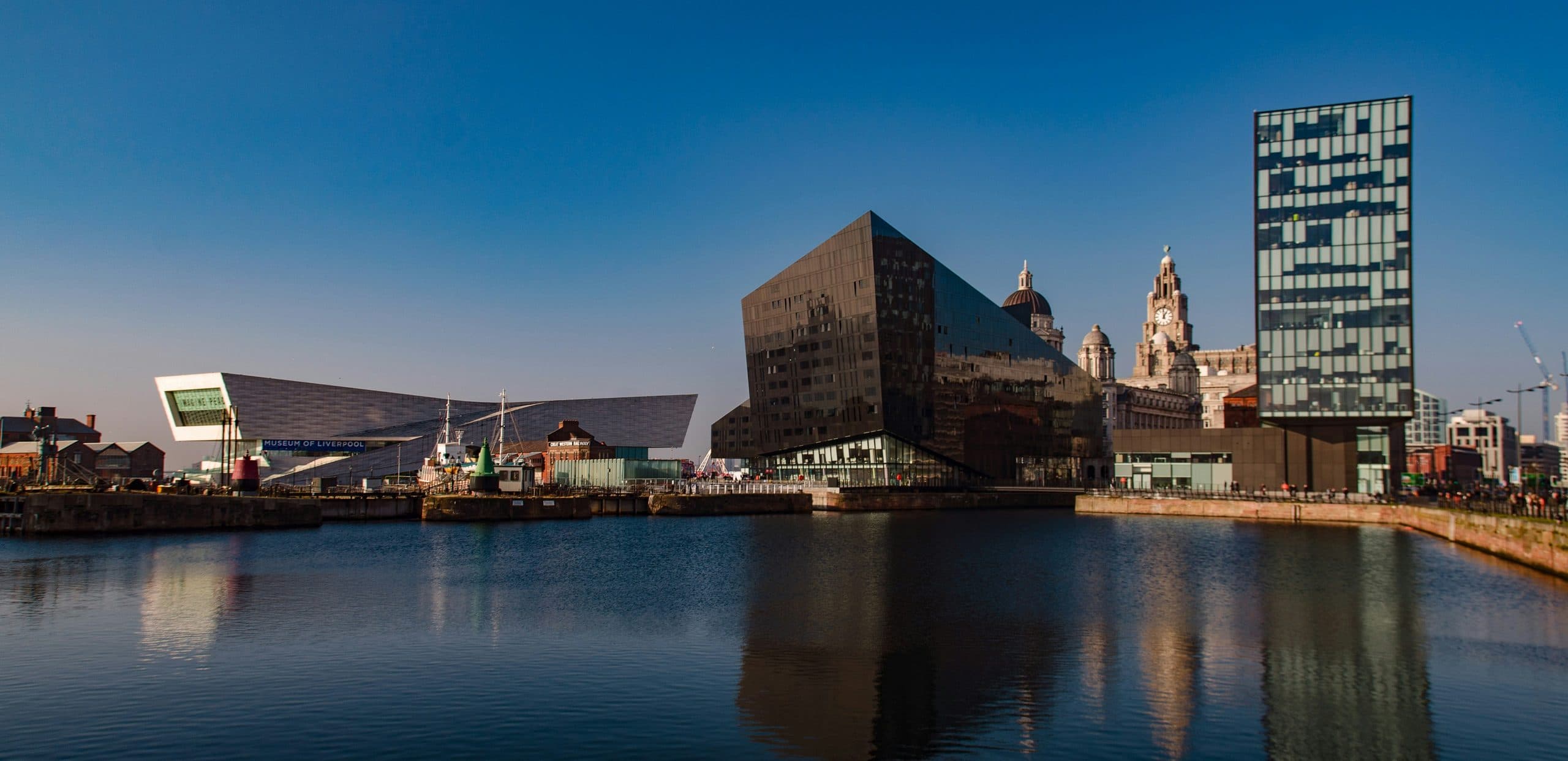 Liverpool waterfront across the dock, with the Museum of Liverpool and the Royal Liver Building