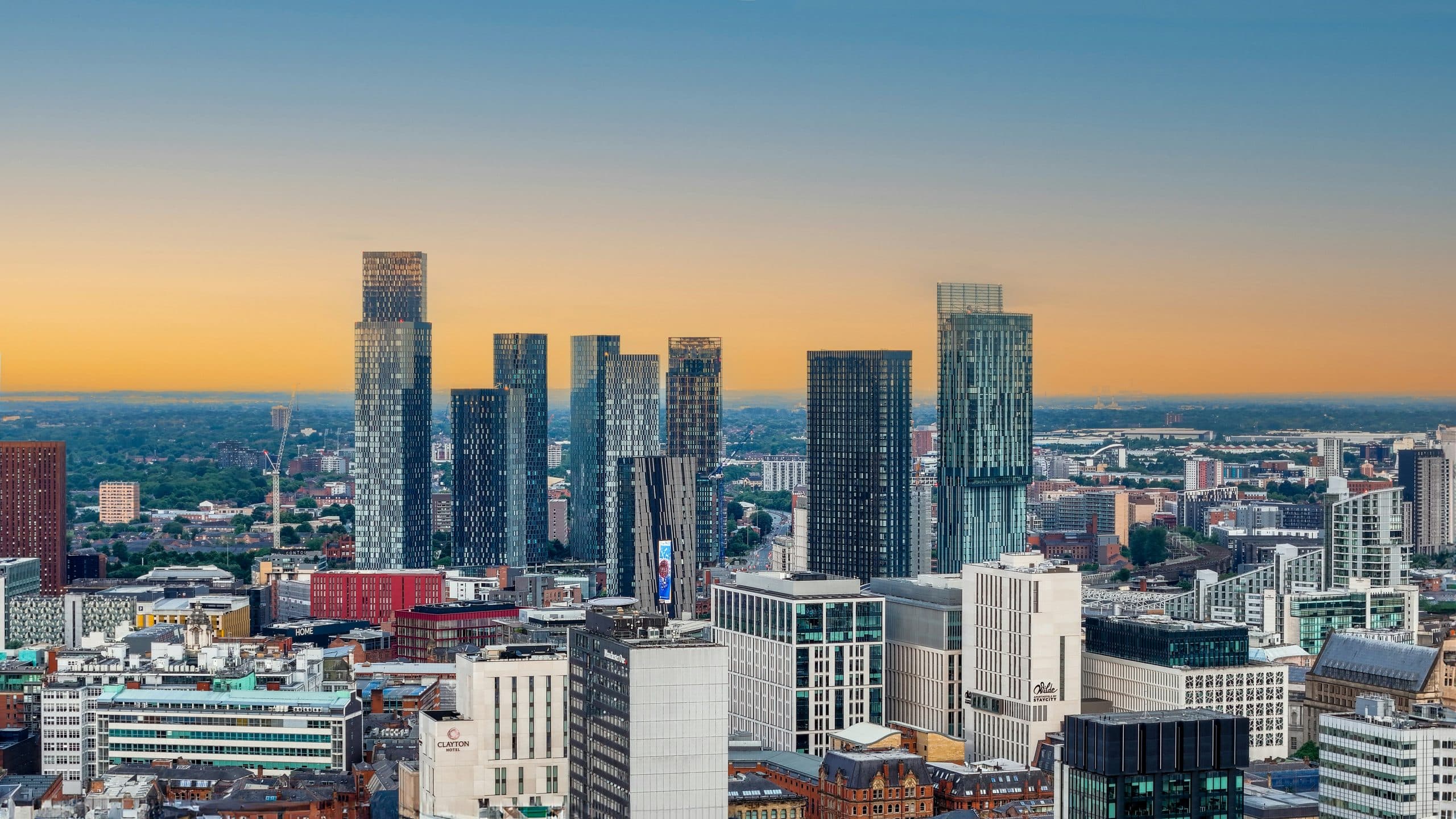Manchester city-centre skyline at sunset, with the Deansgate Square and Beetham towers